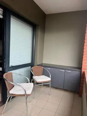 two chairs and a window in a room at Century City Studio with Table Mountain Views in Cape Town