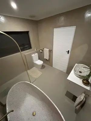 a bathroom with a sink and a toilet and a tub at The Perfect Stay Somerset 1 in Somerset West