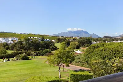 a view of a park with trees and houses at Winelands Golf Lodges 8 in Stellenbosch