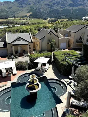 an aerial view of a house with a swimming pool at Franschoek Lermitage Villa Two Bedroom Lake View in Franschhoek