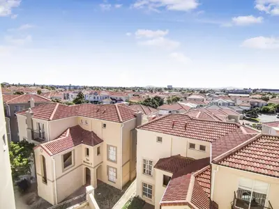 an overhead view of a city with houses at Homely 3 Bedroom apartment in Villa Italia Century City in Cape Town