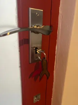 a door with a key hanging from it at Rocket Room in Stellenbosch