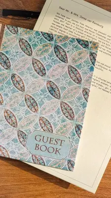 a book with a guest book with a guest book at La Vita e Bella in Wellington