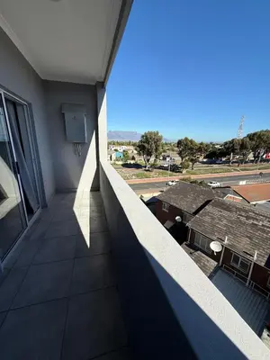 a balcony of a building with a view of a street at Table Mountain View Apartment in Cape Town