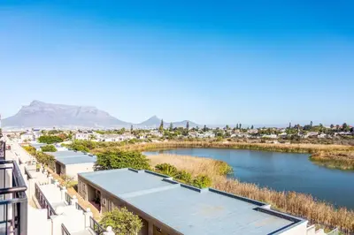 a view of a river from a building at Century on Lake B31 by CTHA in Cape Town
