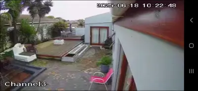 a view of a backyard with a house at Neats Accommodations in Cape Town
