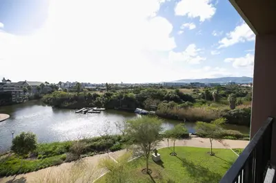 a view of a river from a balcony at 2 Bedroom Waters Edge Apartment in Century City in Cape Town