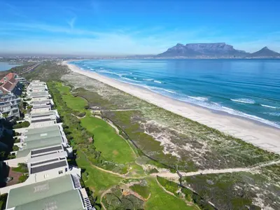 an aerial view of the beach and the ocean at Dolphin View Cabana Beach House in Cape Town