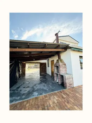 a view of a building with a wooden roof at Rihla Residences - Civic Road in Cape Town