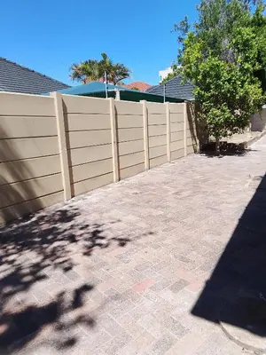a wooden fence in front of a house at Duminy Lodge Monthly Rentals in Bellville