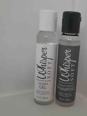 two products sitting next to each other on a shelf at 401 Pip's Place in Strand