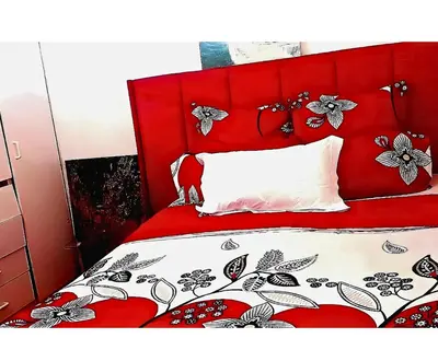 a red bed with a red headboard and a white pillow at Peace Accommodation B&B in Silver Sands