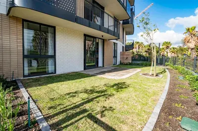 a house with a yard in front of it at Century City Natures Treat in Cape Town