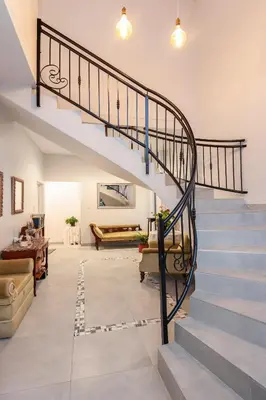 a staircase in a house with a living room at Iets Nuuts in Hermanus