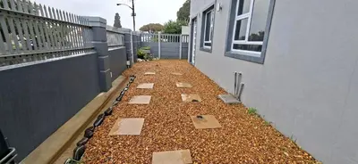 a garden on the side of a building at Murray Guest Suite in Goodwood