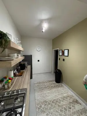 a kitchen with a stove and a counter top at Inside Out Bliss in Paarl