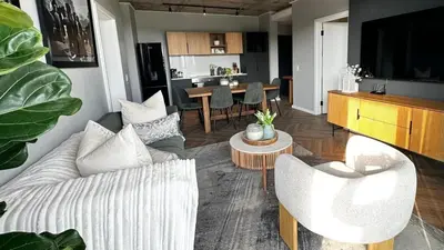 a living room with a couch and a table at ON PARK 317 LUXURY APARTMENT CENTURY CiTY in Century City