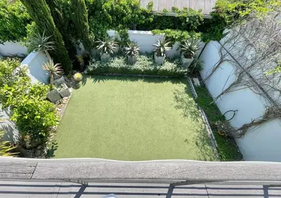 an aerial view of a garden with grass and plants at Franschhoek Gem on Van Wijk in Franschhoek