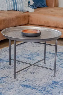 a coffee table in front of a couch at Belle Apartment in Hermanus