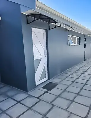 a building with a door on the side of it at Elianta House in Cape Town