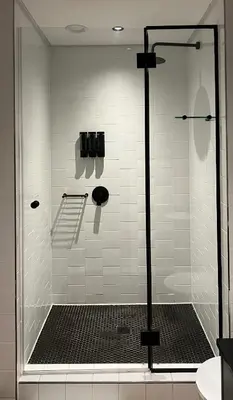 a shower with a glass door in a bathroom at The CoziPlace Lux in Cape Town
