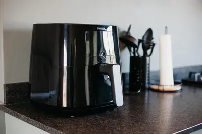 a black coffee pot sitting on top of a counter at Mountain-View Stay, Aircon, WiFi, Parking in Somerset West