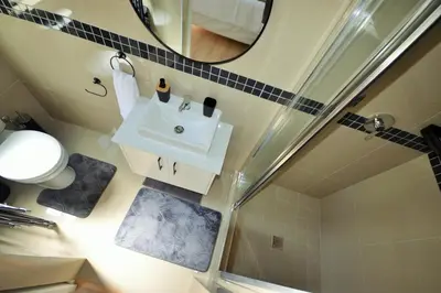 a bathroom with a sink and a mirror at Tweespruit Estate - Stellenbosch- 3 Bedroom House in Stellenbosch