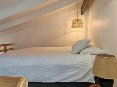 a bedroom with a white bed and a lamp at Your Quiet Retreat Near Cape Town & Wine Country in Hoheizen