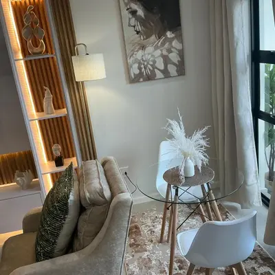 a living room with a couch and a table at DRJ Luxe Table view in Table View