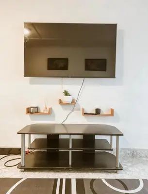 a coffee table in front of a white wall at 4 Jooste Street in Windsor Park