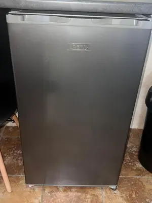 a gray dishwasher sitting under a kitchen counter at Danlavie in Tyger Valley