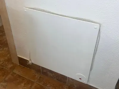 a white door on a wall in a bathroom at Danlavie in Tyger Valley