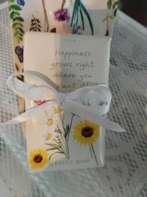 a cake with flowers on it with a note at Heaven Scent in Bettyʼs Bay