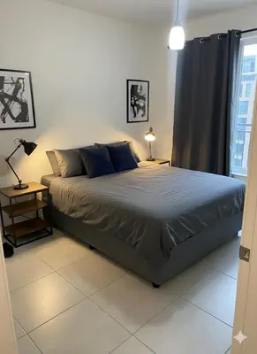 a bedroom with a bed and a window at Cosy spot in Blackheath