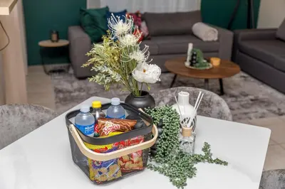 a lunch box on a table in a living room at Home in Durbanville in Oakdale