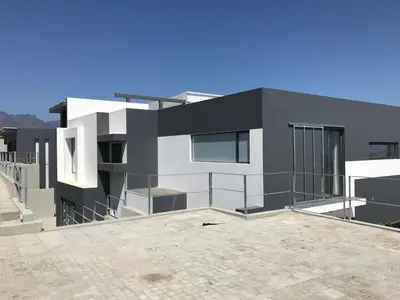 a modern house with black and white at Luxury Family Home in Helderberg
