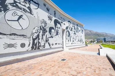 a mural on the side of a building at 410 Riverlands - Lux 1 bedroom Apartment in Cape Town