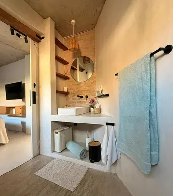 a bathroom with a sink and a mirror at Tranquille Haven - serene escape in Franschhoek in Franschhoek