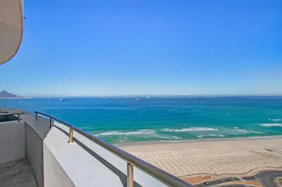 a view of the ocean from a balcony at Horizon Bay 1602 Penthouse APT with lovely views in Cape Town