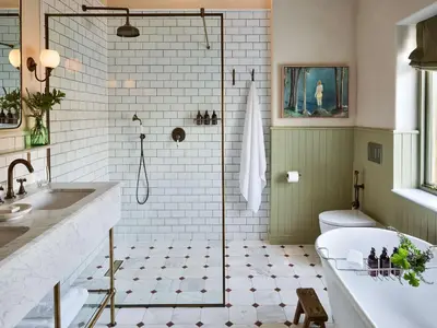 a bathroom with a shower and a tub and a toilet at Spier Hotel and Wine Farm in Stellenbosch