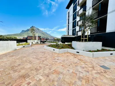 a view of a building with a mountain in the background at Cape Town Studio for business travel in Cape Town