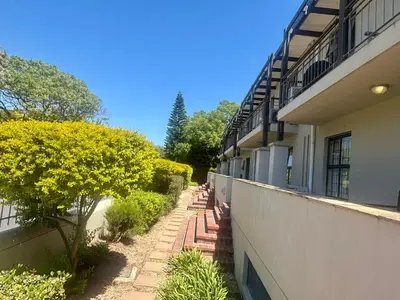 a walkway leading to the side of a building at 3 Vilaroux in Stellenbosch