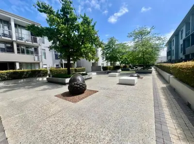 a courtyard in a building with black and white sculptures at Sonvanger Studio at Andringa Mall Luxury Apartments in Stellenbosch