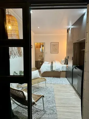 a room with a view of a bedroom at Little Heaven in Cape Town