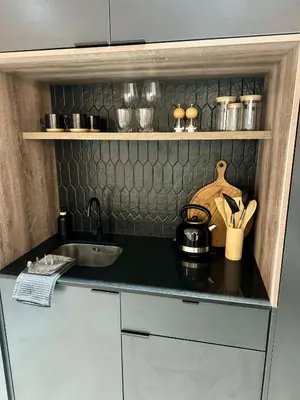 a kitchen with a sink and a counter top at Little Heaven in Cape Town