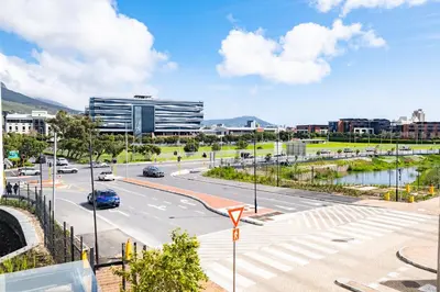 a city street with a road and a building at 723 Riverlands - Lux 1 bedroom Apartment in Cape Town