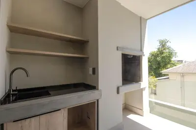 a kitchen with a sink and a window at Stylish Apartment in Cape Winelands District in Stellenbosch