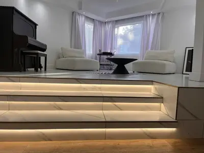 a living room with a dresser with a television on it at 2 on Aurora Island in Durbanville