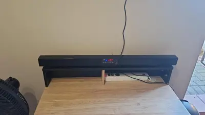 a black computer monitor sitting on top of a table at MDA Myburgh in Brackenfell