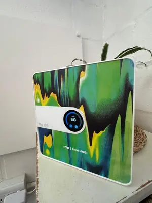 a phone sitting on top of a counter with aperature at Studio Seabiscuit in Cape Town